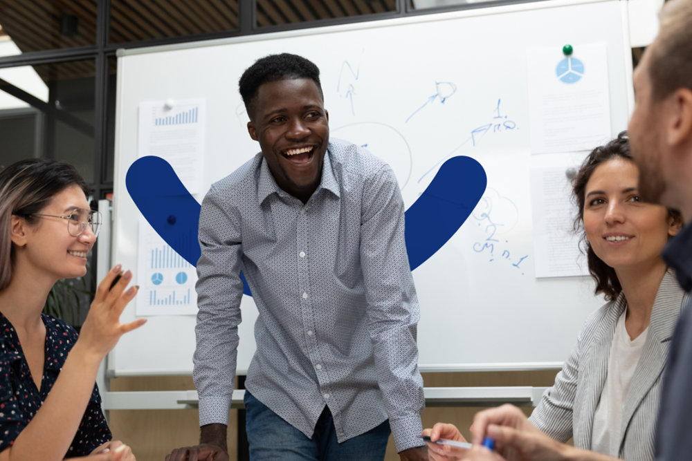 Employees discuss and share their joy over a colleague's internal promotion (1)